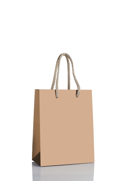 Premium PSD | Gold paper shopping bag isolated.