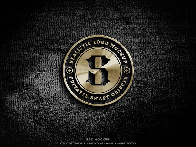  Golden metallic logo mockup on rough black denim fabric