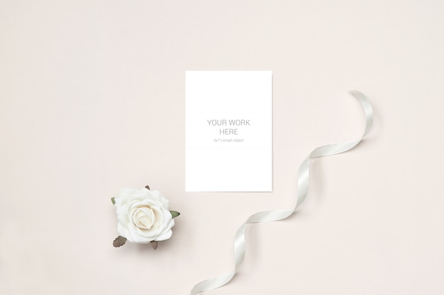 Download Greeting card mockup with rosa and ribbon | Premium PSD File