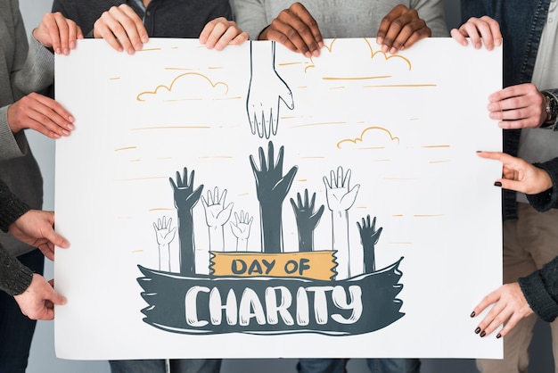 Free Psd Group Of People Holding Placard Mockup For Charity