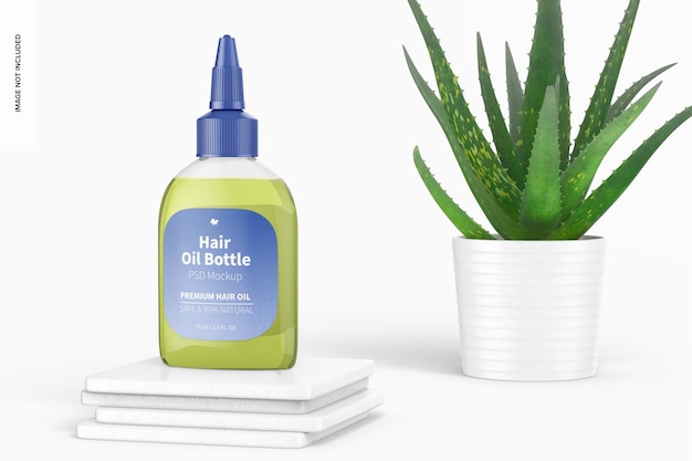 Download Premium PSD | Hair oil bottle mockup with aloe plant