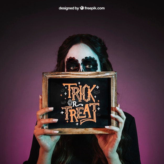 Download Halloween mockup with girl showing slate PSD file | Free Download