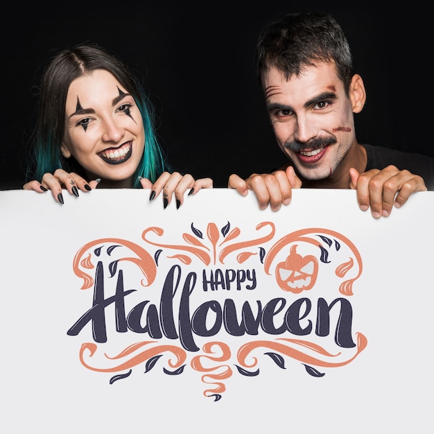 Download Halloween mockup with lettering on big board and couple PSD file | Free Download