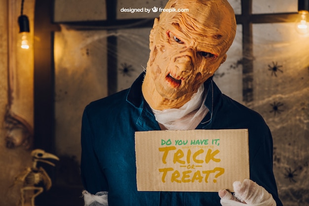 Download Halloween mockup with monster showing cardboard | Free PSD ...