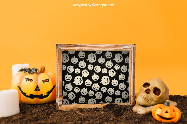 Download Free PSD | Halloween mockup with slate and pumpkin decoration