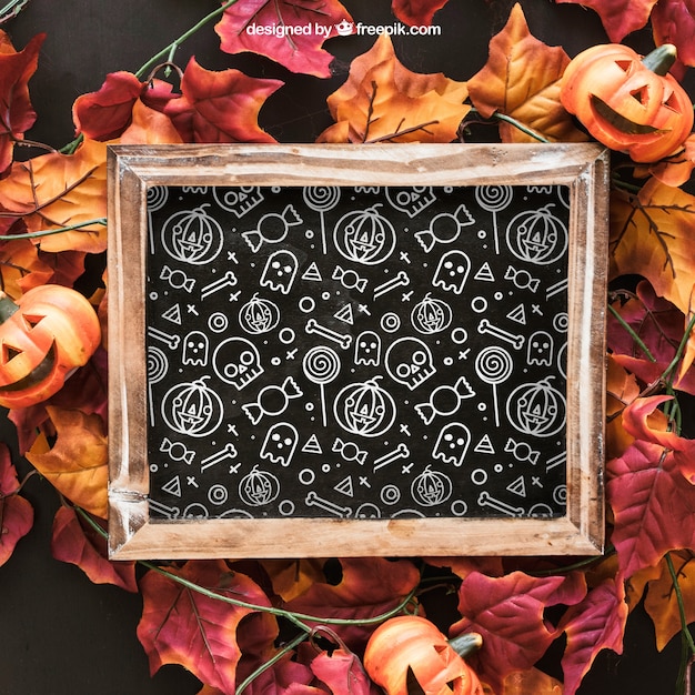 Free PSD | Halloween Slate Mockup With Leaves And Pumpkins