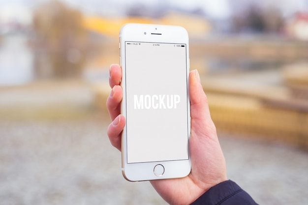 Download Hand holding a smartphone mock up PSD file | Free Download