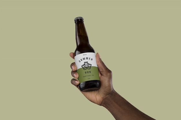 Download Premium Psd Hand Holding Beer Bottle Mockup PSD Mockup Templates