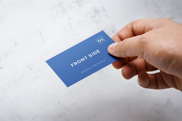 Download Hand holding business card mockup | Premium PSD File