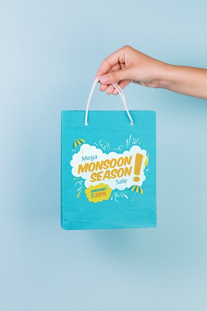 Download Free Psd Hand Holding Shopping Bag Mockup Yellowimages Mockups