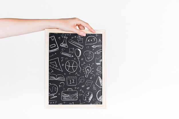 Hand holding slate mockup
