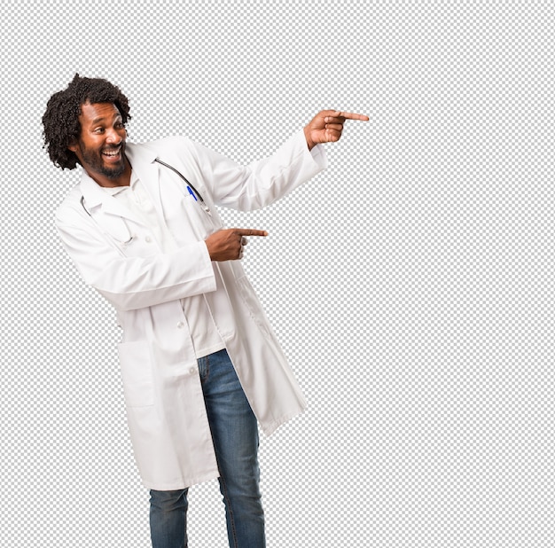 Premium Psd Handsome African American Medical Doctor Pointing To The Side