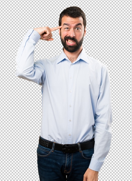 Handsome man with beard making crazy gesture Premium Psd