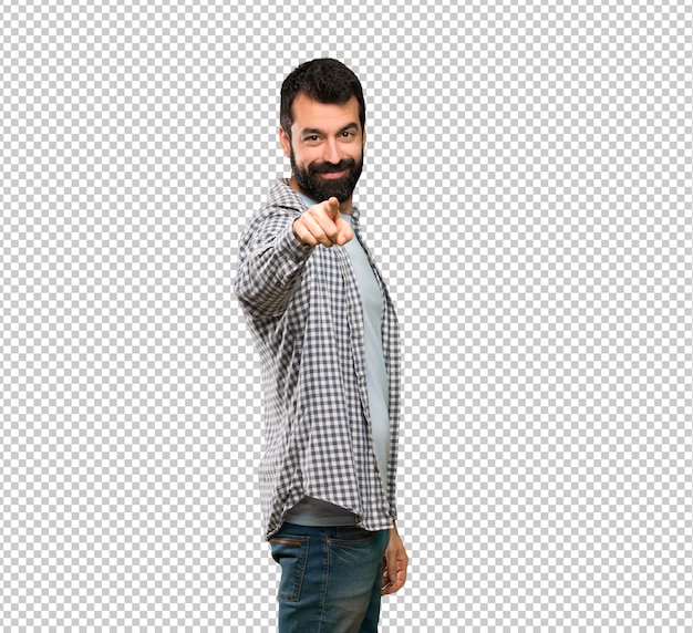 Handsome man with beard points finger at you with a confident expression Premium Psd