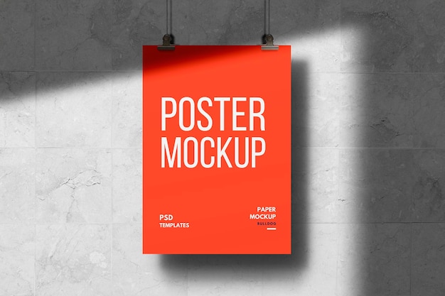 Premium PSD | Hanging poster mockup on wall texture background