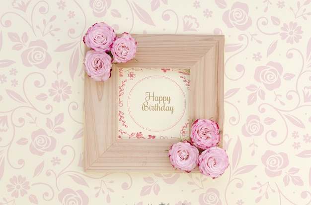 Download Free PSD | Happy birthday mock-up frame with flowers