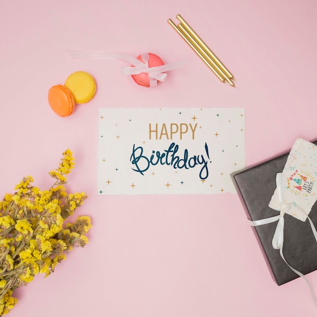 Download Happy birthday mock-up with invitation card and flowers | Free PSD File