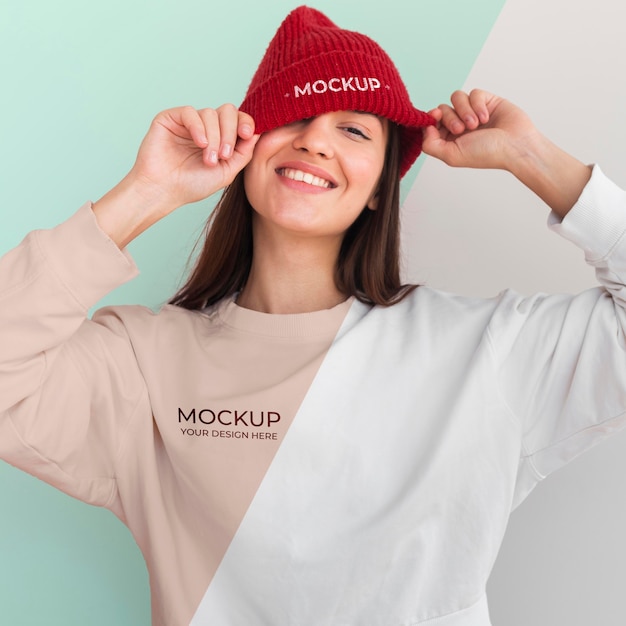 Download Free PSD | Happy woman wearing a hoodie and a blouse mock-up