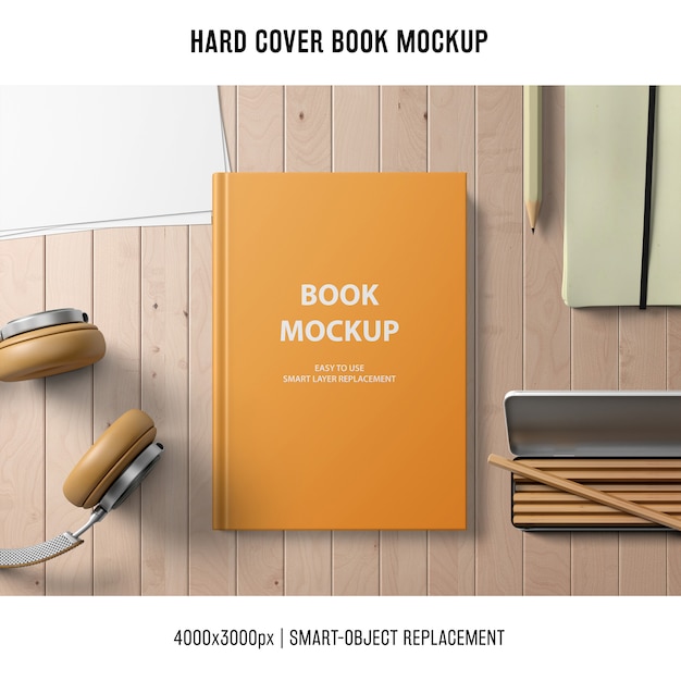 Download Hard cover book mockup with headphones and pencils PSD ...