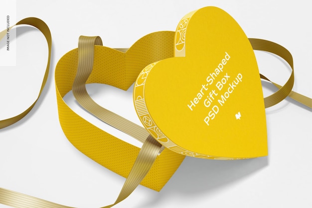 Download Premium PSD | Heart-shaped gift box with paper ribbon mockup, perspective view