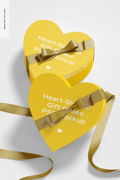 Download Premium PSD | Heart-shaped gift boxes with paper ribbon mockup