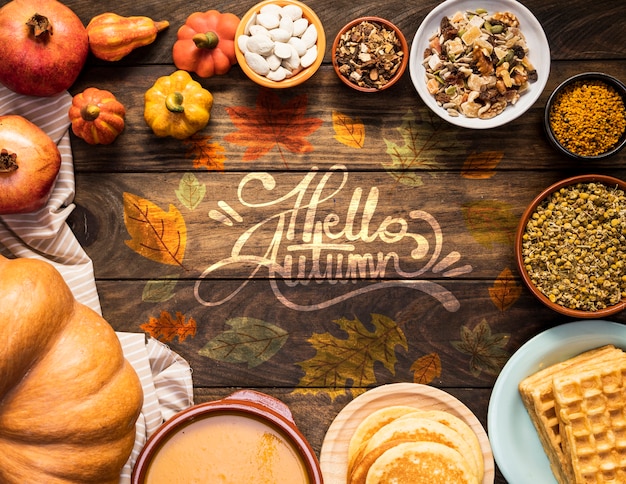Free PSD | Hello autumn quote surrounded by delicious fall food
