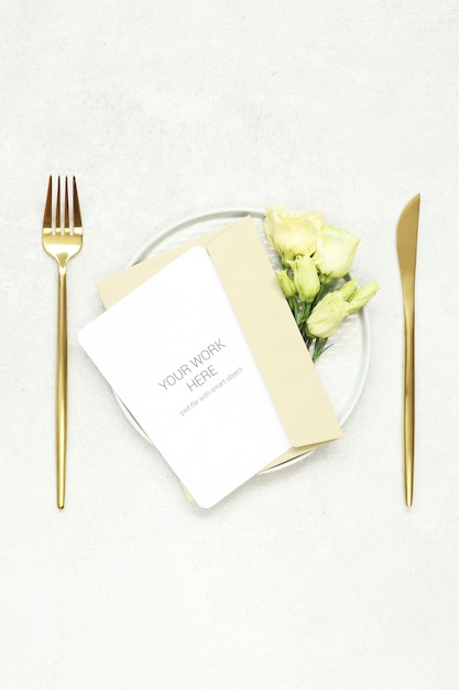 Download Invitation card mockup on plate and gold cutlery | Premium ...
