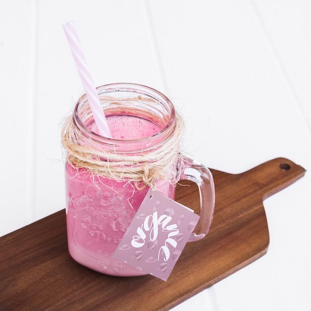Download Jar mockup with pink yogurt | Free PSD File