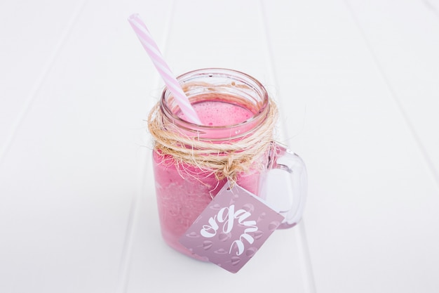 Download Jar mockup with pink yogurt | Free PSD File