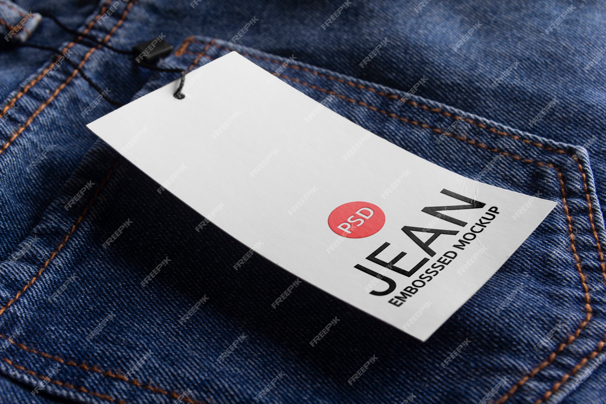 Premium PSD | Jean with a tag embossed mockup psd.