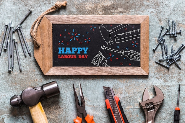 Download Free PSD | Labor day mockup with slate and tools