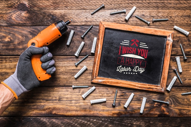 Download Free PSD | Labor day mockup with slate and tools
