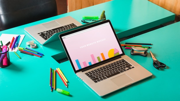 Download Laptop mockup on desk | Free PSD File