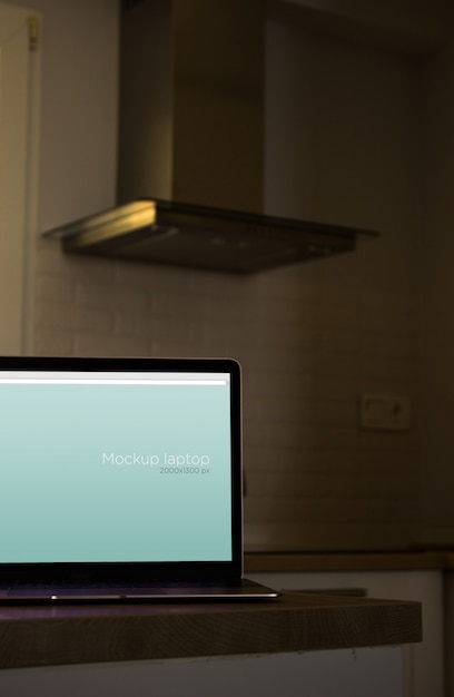 Download Laptop mockup in kitchen | Free PSD File
