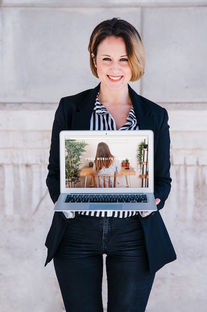 Download Laptop mockup with businesswoman PSD file | Free Download PSD Mockup Templates