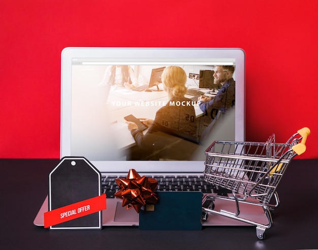 Download Laptop mockup with online shopping concept | Free PSD File