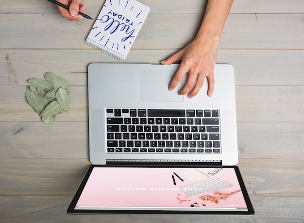 Download Laptop mockup with person typing on keyboard | Free PSD File PSD Mockup Templates