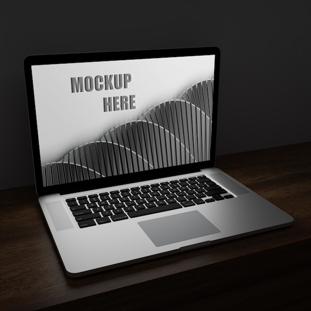 Download Laptop screen mockup in the dark on wooden desk | Premium ... PSD Mockup Templates