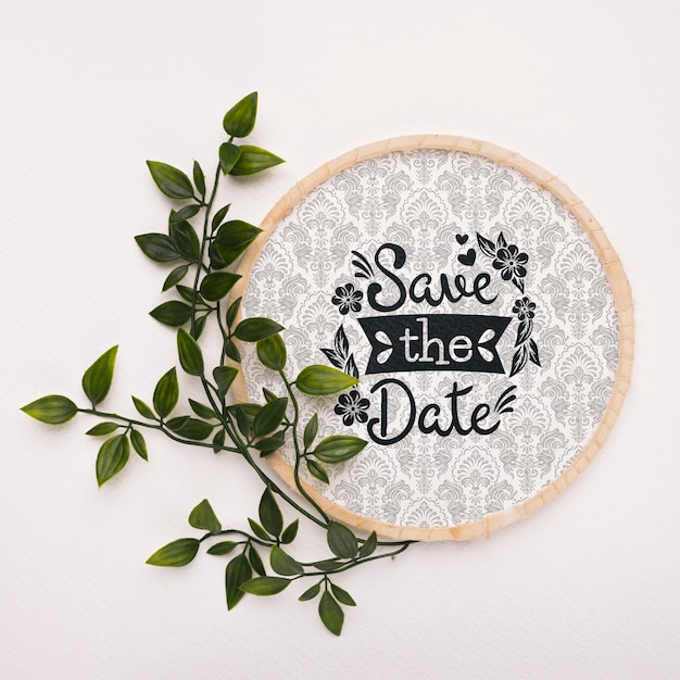 Download Leaves with circular frame save the date mock-up | Free PSD File