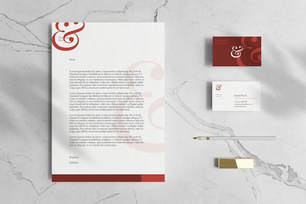 Download Letterhead a4 document with business card and stationery mockup in marble floor | Premium PSD File