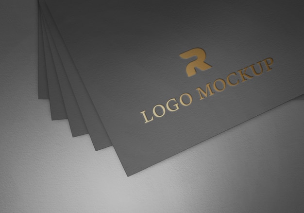 Download Logo gold foil on textured black paper mockup template ...