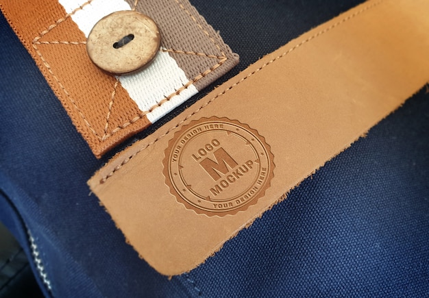 Download Logo on leather bag pocket mockup | Premium PSD File