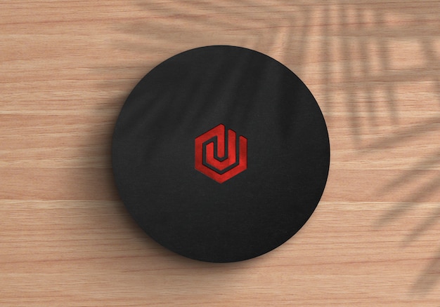 Download Premium PSD | Logo mockup on a black round paper box