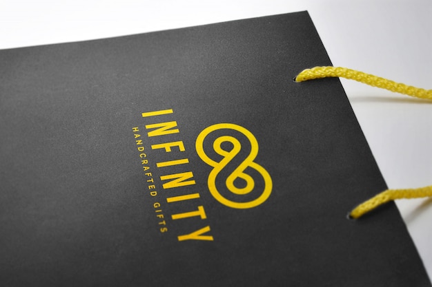 Download Logo mockup on a hard paper bag | Premium PSD File