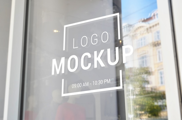 Download Logo mockup on store front door window | Premium PSD File PSD Mockup Templates