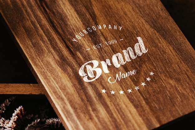 Download Logo on wooden table mock up | Free PSD File