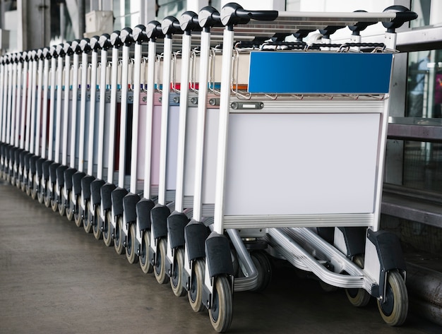 Download Luggage trolley at the airport with sign mockup PSD file | Free Download