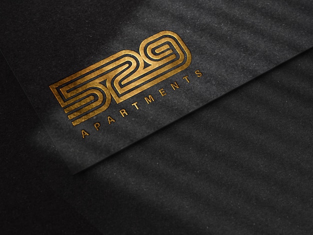 Download Luxury embossed logo mockup on black paper texture | Premium PSD File