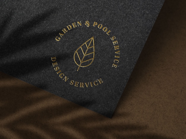Download Premium PSD | Luxury gold logo mockup on black paper texture