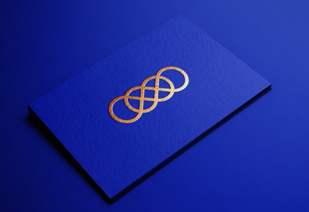 Luxury golden logo mockup on blue embossed business card ...